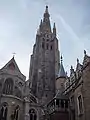 The Basilica of Our Lady of Bruges, Belgium has a statue of the Madonna by Michelangelo.