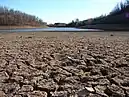 A dry riverbed in California, which is experiencing its worst megadrought in 1,200 years..mw-parser-output cite.citation{font-style:inherit;word-wrap:break-word}.mw-parser-output .citation q{quotes:"\"""\"""'""'"}.mw-parser-output .citation:target{background-color:rgba(0,127,255,0.133)}.mw-parser-output .id-lock-free.id-lock-free a{background:url("//upload.wikimedia.org/wikipedia/commons/6/65/Lock-green.svg")right 0.1em center/9px no-repeat}body:not(.skin-timeless):not(.skin-minerva) .mw-parser-output .id-lock-free a{background-size:contain}.mw-parser-output .id-lock-limited.id-lock-limited a,.mw-parser-output .id-lock-registration.id-lock-registration a{background:url("//upload.wikimedia.org/wikipedia/commons/d/d6/Lock-gray-alt-2.svg")right 0.1em center/9px no-repeat}body:not(.skin-timeless):not(.skin-minerva) .mw-parser-output .id-lock-limited a,body:not(.skin-timeless):not(.skin-minerva) .mw-parser-output .id-lock-registration a{background-size:contain}.mw-parser-output .id-lock-subscription.id-lock-subscription a{background:url("//upload.wikimedia.org/wikipedia/commons/a/aa/Lock-red-alt-2.svg")right 0.1em center/9px no-repeat}body:not(.skin-timeless):not(.skin-minerva) .mw-parser-output .id-lock-subscription a{background-size:contain}.mw-parser-output .cs1-ws-icon a{background:url("//upload.wikimedia.org/wikipedia/commons/4/4c/Wikisource-logo.svg")right 0.1em center/12px no-repeat}body:not(.skin-timeless):not(.skin-minerva) .mw-parser-output .cs1-ws-icon a{background-size:contain}.mw-parser-output .cs1-code{color:inherit;background:inherit;border:none;padding:inherit}.mw-parser-output .cs1-hidden-error{display:none;color:#d33}.mw-parser-output .cs1-visible-error{color:#d33}.mw-parser-output .cs1-maint{display:none;color:#2C882D;margin-left:0.3em}.mw-parser-output .cs1-format{font-size:95%}.mw-parser-output .cs1-kern-left{padding-left:0.2em}.mw-parser-output .cs1-kern-right{padding-right:0.2em}.mw-parser-output .citation .mw-selflink{font-weight:inherit}html.skin-theme-clientpref-night .mw-parser-output .cs1-maint{color:#18911F}html.skin-theme-clientpref-night .mw-parser-output .cs1-visible-error,html.skin-theme-clientpref-night .mw-parser-output .cs1-hidden-error{color:#f8a397}@media(prefers-color-scheme:dark){html.skin-theme-clientpref-os .mw-parser-output .cs1-visible-error,html.skin-theme-clientpref-os .mw-parser-output .cs1-hidden-error{color:#f8a397}html.skin-theme-clientpref-os .mw-parser-output .cs1-maint{color:#18911F}}Irina Ivanova (June 2, 2022). "California is rationing water amid its worst drought in 1,200 years". CBS News.