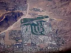 Aerial view of south west Palm Springs (facing south), with the Canyon Country Club in the center