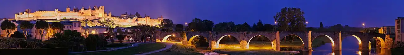 The fortified city of Carcassonne and the Pont Vieux crossing the Aude river