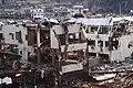 Cars washed up on the roofs of buildings: 30 March 2011.