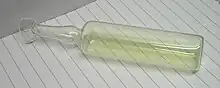 A glass container filled with chlorine gas