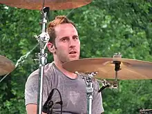 Comeau playing with Simple Plan at Six Flags New England on June 22, 2008