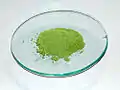 Copper(I) chloride, a copper(I) compound. It is white but air reacts with it easily to turn it green