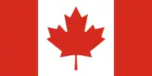 A vertical triband design (red, white, red) with a red maple leaf in the center.