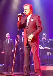 Valli performing at the Saban Theatre in 2013