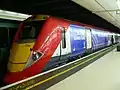 Another Class 460 train, this one waiting at Victoria station and marked with a Continental Airlines logo.