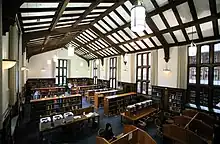 A large room with high ceilings and many bookshelves