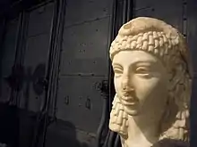 A bust that could belong to Cleopatra VII wearing Vulture crown, now at Centrale Montemartini Museum