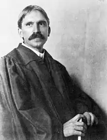 A black and white photo of John Dewey.