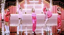 Image of Kara members dancing dressed in pink