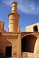 The tower on a mosque is called a minaret. This one is in Iran