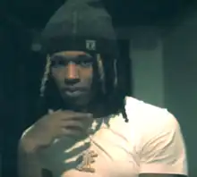 King Von in the music video for 151 The Bully Gang's "Fuck U Sayin"