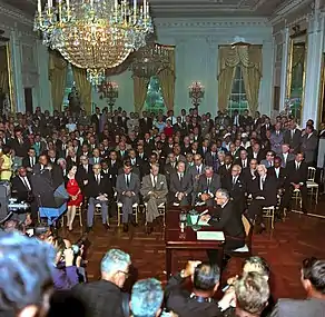 Johnson speaks to the media after signing the Act