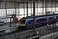 A First Transpennine Express train.  These run from Leeds to Kingston upon Hull, Newcastle upon Tyne, Middlesborough and Scarborough in the East as well as Manchester Picadilly, Manchester Airport, Liverpool Lime Street and Blackpool North in the West.