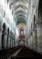 Lisieux Cathedral shows the nave and the aisles, the upper clerestory windows and the ribbed vault.