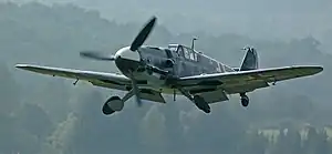 A Messerschmitt Bf 109 figher plane in flight