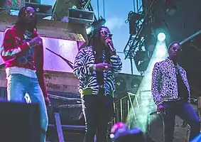 Migos performing at the 2017 Veld Festival (from left to right: Quavo, Takeoff, and Offset)