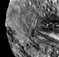 An array of fractures, grooves and craters. This clear-filter, narrow-angle view shows areas of older, heavily cratered terrain with a wide variety of forms.