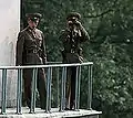 North Korean border troops monitor Conference Row activity from an elevated observation post in the JSA .  37°57′20.14″N 126°40′40.90″E﻿ / ﻿37.9555944°N 126.6780278°E﻿ / 37.9555944; 126.6780278