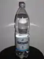 A PET bottle (containing mineral water)