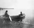 Ojibway women in canoe on Leech Lake.