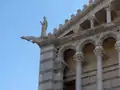 Gargoyle at the cathedral in Pisa, Italy