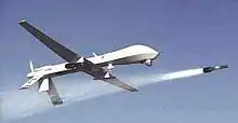 Unmanned aerial vehicle, launching a missile