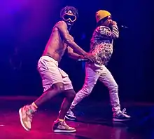 Slim Jxmmi (left) and Swae Lee (right) performing in 2015