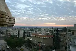 Sunset over the rooftops in one of the modern quarters of the city