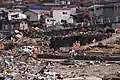 Rescue team from India searches for survivors in Onagawa.