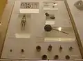 Toys from Ancient Rome, including a few that are still played with today, including a doll, dice, rattles, and toy dishes