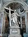 Four large statues are in the piers near the High Altar. Saint Helena holds the True Cross which she found in Jerusalem.