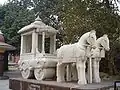 A sculpture of a Hindu horsecart in Delhi, India.