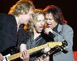 Styx performing live in Hinckley, MN on June 13, 2008. (left to right: James "J.Y." Young, Tommy Shaw, Lawrence Gowan)