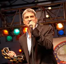 Taylor Hicks performs for troops aboard the USS Ronald Reagan, docked at Coronado, California on December 19, 2006