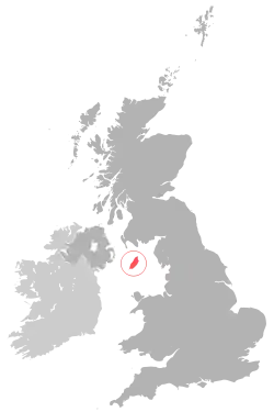 Location of  Isle of Man  (red)in the Irish Sea (Manx Sea) between England · Scotland · Wales and Northern Ireland  (dark grey)