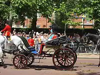 Queen Elizabeth II and Prince Philip in a park phaeton at ceremonial trooping the colours, 2009