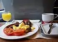 The complimentary breakfast was served to passengers in First Class aboard the Class 390 Pendolino trains before the improved service was launched in January 2009.