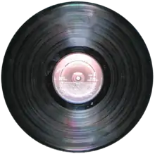 Most LPs were pressed in black vinyl with a paper label in the center of each side. However, colored and picture discs were also made