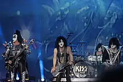 Kiss onstage in 2013 @ Hellfest.From left to right: Gene Simmons, Paul Stanley, Eric Singer and Tommy Thayer.