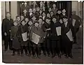 Newsboys for the Forward wait for their copies in the early morning hours in March 1913.