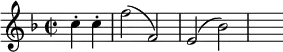 { \key f \major \time 2/2 \partial 2 \relative c'' { c4-. c-. | f2( f,) | e( bes') | s } }