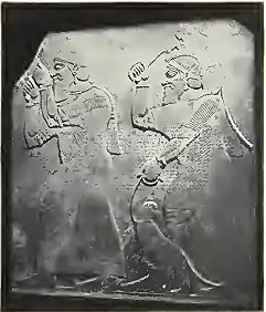 1911 Britannica - Babylonia-Sculptured relief.png