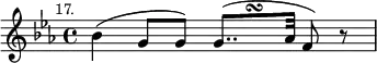 { \relative b' { \key c \minor \time 4/4 \mark \markup \small "17."
 bes4^( g8 g) g8..*1/2[^( \once \hideNotes g\turn aes32] f8) r } }