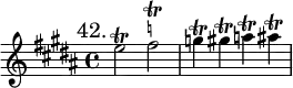 { \mark "42." \key b \major \time 4/4 \relative e'' {
  e2\trill fis^\markup \teeny \natural \trill | g4\trill gis\trill a\trill ais\trill } }