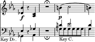 { \override Score.TimeSignature #'stencil = ##f \override Score.Rest #'style = #'classical << \new Staff { \time 3/4 \key ees \major \relative d' { <des bes'>4\f r <c aes> | R2.\fermata | b'4\(\p c2 | b4\) } }
\new Staff { \clef bass \key ees \major << \new Voice { \stemUp ees4 r ges | R2._\fermata | d'!4 ees'2 | d'4 }
\new Voice { \stemDown ges,4_\markup { \halign #1.5 { "Key D♭." } } s aes, | s2. | g!8_\markup { Key C. } g g g g g | g4 } >> } >> }