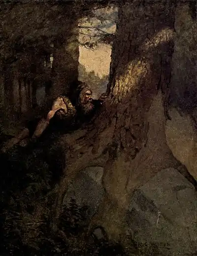 A bearded man hides behind the trunk of a large tree, watching events outside the frame of the image.