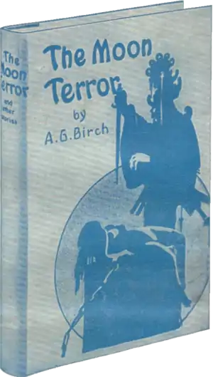 Monochrome blue-tinted photograph of a copy of The Moon Terror, a hard-backed book illustrated with a woman tied to an altar and an ornately dressed man about to sacrifice her; with a large moon or circle in the background.