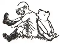 Christopher Robin and Winnie-the-Pooh seated back-to-back